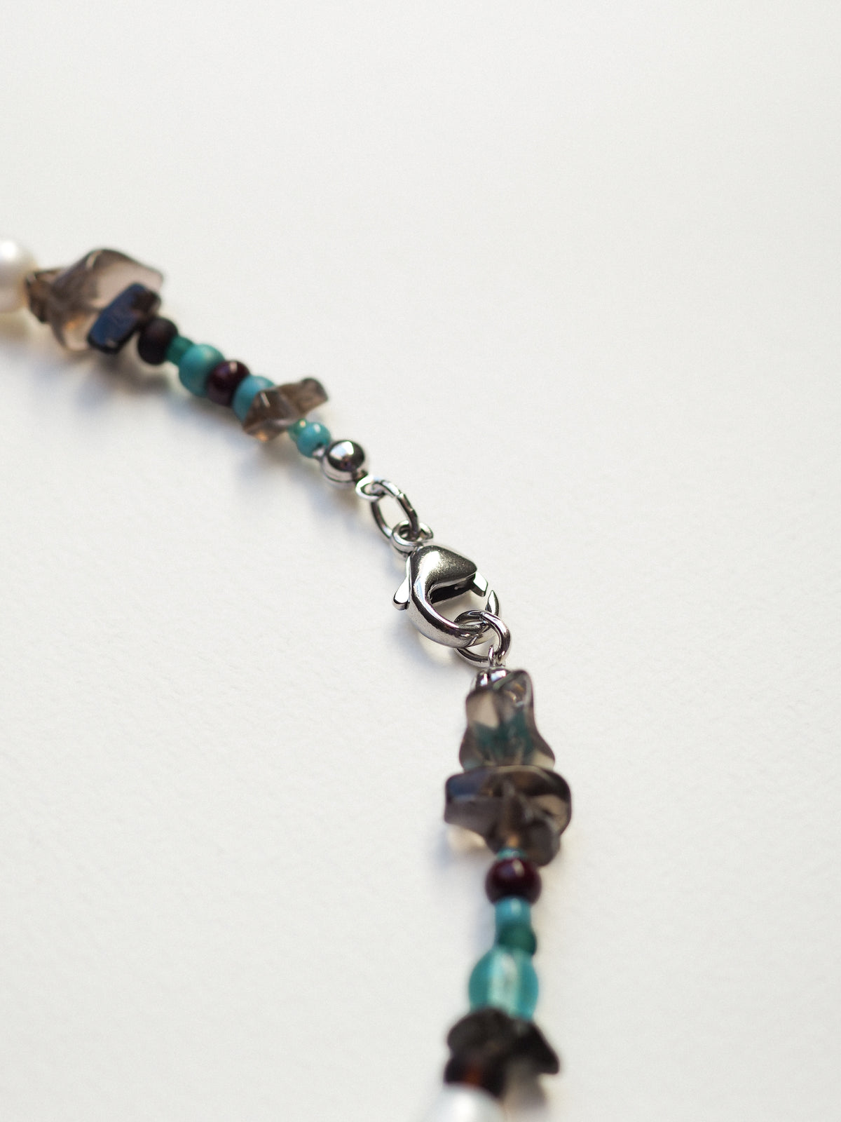 SMOKE SHELL – Perlenkette